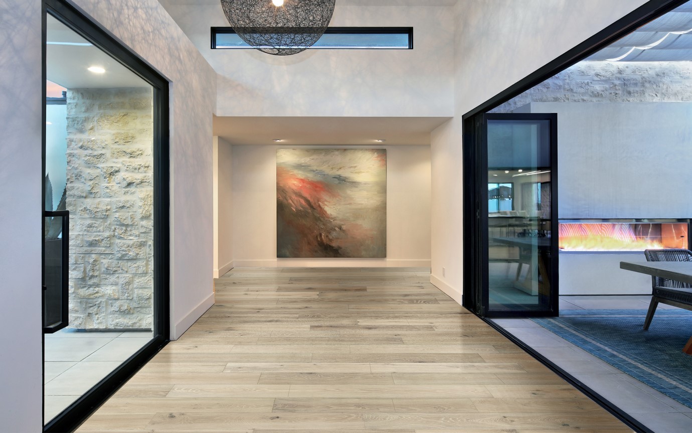 Wide-plank hardwood flooring in a bright, modern Chicago-area interior